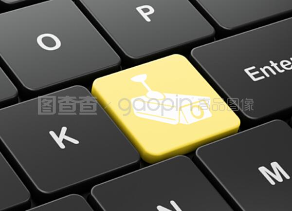 电脑键盘背景下的闭路电视摄影机保安概念